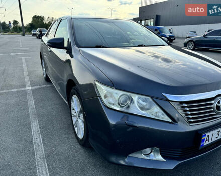 Серый Тойота Камри, объемом двигателя 2.49 л и пробегом 240 тыс. км за 12900 $, фото 1 на Automoto.ua