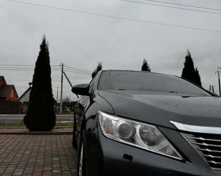 Сірий Тойота Камрі, об'ємом двигуна 2.49 л та пробігом 253 тис. км за 10799 $, фото 1 на Automoto.ua