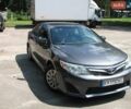 Серый Тойота Камри, объемом двигателя 2.49 л и пробегом 325 тыс. км за 12500 $, фото 1 на Automoto.ua