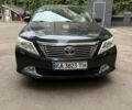 Серый Тойота Камри, объемом двигателя 2.49 л и пробегом 211 тыс. км за 13999 $, фото 1 на Automoto.ua