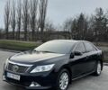 Серый Тойота Камри, объемом двигателя 2.5 л и пробегом 375 тыс. км за 10500 $, фото 1 на Automoto.ua
