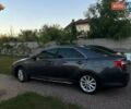 Серый Тойота Камри, объемом двигателя 2.49 л и пробегом 229 тыс. км за 12800 $, фото 6 на Automoto.ua