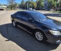 Серый Тойота Камри, объемом двигателя 2.5 л и пробегом 249 тыс. км за 12700 $, фото 2 на Automoto.ua