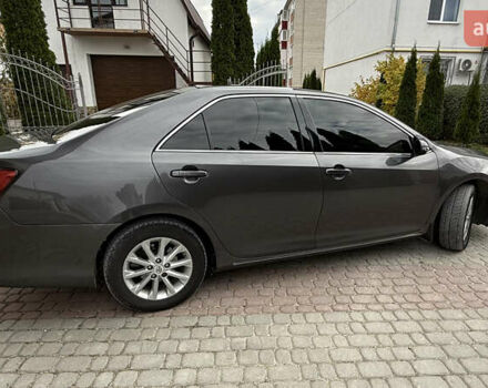 Серый Тойота Камри, объемом двигателя 2.49 л и пробегом 252 тыс. км за 11499 $, фото 2 на Automoto.ua