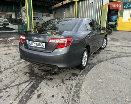 Серый Тойота Камри, объемом двигателя 2.49 л и пробегом 220 тыс. км за 8500 $, фото 3 на Automoto.ua