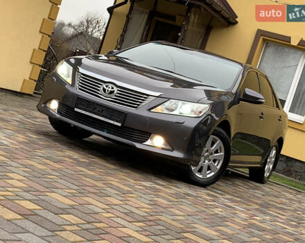 Сірий Тойота Камрі, об'ємом двигуна 2.49 л та пробігом 225 тис. км за 12800 $, фото 1 на Automoto.ua