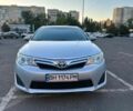 Серый Тойота Камри, объемом двигателя 2.49 л и пробегом 330 тыс. км за 11700 $, фото 1 на Automoto.ua