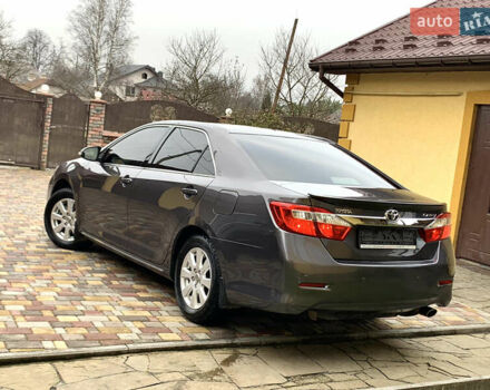 Сірий Тойота Камрі, об'ємом двигуна 2.49 л та пробігом 225 тис. км за 12800 $, фото 7 на Automoto.ua