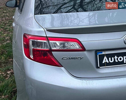 Сірий Тойота Камрі, об'ємом двигуна 2.5 л та пробігом 297 тис. км за 10390 $, фото 9 на Automoto.ua