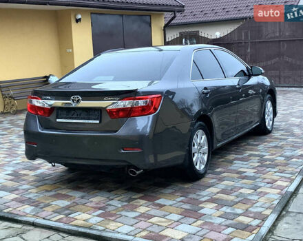 Сірий Тойота Камрі, об'ємом двигуна 2.49 л та пробігом 225 тис. км за 12800 $, фото 19 на Automoto.ua