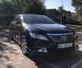 Серый Тойота Камри, объемом двигателя 2.5 л и пробегом 192 тыс. км за 15400 $, фото 1 на Automoto.ua