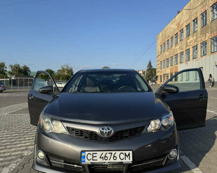 Серый Тойота Камри, объемом двигателя 2.5 л и пробегом 180 тыс. км за 12500 $, фото 1 на Automoto.ua