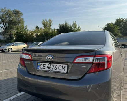Серый Тойота Камри, объемом двигателя 2.5 л и пробегом 180 тыс. км за 12500 $, фото 4 на Automoto.ua