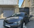 Серый Тойота Камри, объемом двигателя 2.5 л и пробегом 300 тыс. км за 7900 $, фото 1 на Automoto.ua