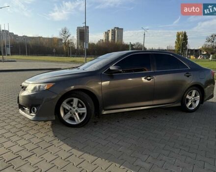 Сірий Тойота Камрі, об'ємом двигуна 2.49 л та пробігом 209 тис. км за 11700 $, фото 1 на Automoto.ua