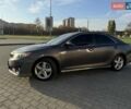 Сірий Тойота Камрі, об'ємом двигуна 2.49 л та пробігом 209 тис. км за 11700 $, фото 1 на Automoto.ua