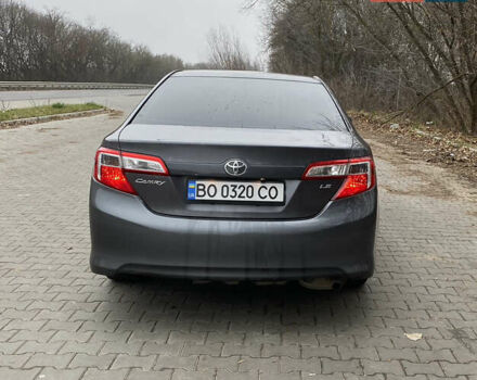 Сірий Тойота Камрі, об'ємом двигуна 2.4 л та пробігом 241 тис. км за 12600 $, фото 3 на Automoto.ua