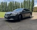 Сірий Тойота Камрі, об'ємом двигуна 2.5 л та пробігом 300 тис. км за 12800 $, фото 1 на Automoto.ua