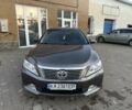 Серый Тойота Камри, объемом двигателя 2.5 л и пробегом 250 тыс. км за 12000 $, фото 1 на Automoto.ua