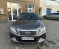 Серый Тойота Камри, объемом двигателя 2.5 л и пробегом 235 тыс. км за 13000 $, фото 1 на Automoto.ua