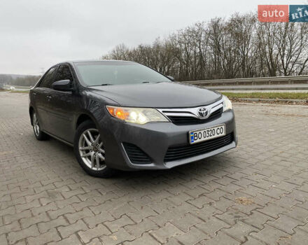 Сірий Тойота Камрі, об'ємом двигуна 2.4 л та пробігом 241 тис. км за 12600 $, фото 1 на Automoto.ua