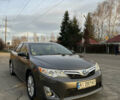 Серый Тойота Камри, объемом двигателя 2.49 л и пробегом 135 тыс. км за 14200 $, фото 2 на Automoto.ua