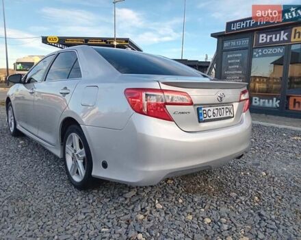Серый Тойота Камри, объемом двигателя 2.49 л и пробегом 230 тыс. км за 9800 $, фото 3 на Automoto.ua