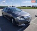 Серый Тойота Камри, объемом двигателя 2.49 л и пробегом 170 тыс. км за 11400 $, фото 1 на Automoto.ua