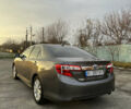 Серый Тойота Камри, объемом двигателя 2.49 л и пробегом 135 тыс. км за 14200 $, фото 5 на Automoto.ua