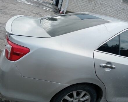 Серый Тойота Камри, объемом двигателя 2.5 л и пробегом 211 тыс. км за 10500 $, фото 3 на Automoto.ua