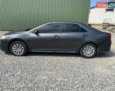 Серый Тойота Камри, объемом двигателя 2.49 л и пробегом 100 тыс. км за 11499 $, фото 1 на Automoto.ua