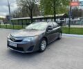 Серый Тойота Камри, объемом двигателя 2.49 л и пробегом 183 тыс. км за 13900 $, фото 1 на Automoto.ua