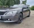Серый Тойота Камри, объемом двигателя 2.49 л и пробегом 266 тыс. км за 11900 $, фото 1 на Automoto.ua