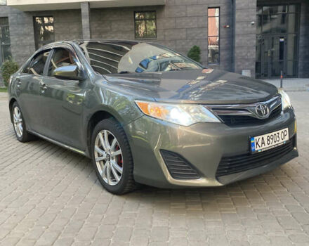 Серый Тойота Камри, объемом двигателя 2.49 л и пробегом 340 тыс. км за 10500 $, фото 1 на Automoto.ua