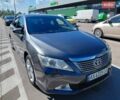 Серый Тойота Камри, объемом двигателя 2.49 л и пробегом 320 тыс. км за 9999 $, фото 1 на Automoto.ua