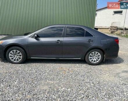 Серый Тойота Камри, объемом двигателя 2.49 л и пробегом 100 тыс. км за 11499 $, фото 3 на Automoto.ua