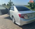 Серый Тойота Камри, объемом двигателя 2.49 л и пробегом 210 тыс. км за 12100 $, фото 1 на Automoto.ua