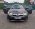 Серый Тойота Камри, объемом двигателя 2.49 л и пробегом 175 тыс. км за 11500 $, фото 1 на Automoto.ua