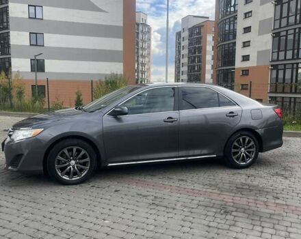 Сірий Тойота Камрі, об'ємом двигуна 2.49 л та пробігом 224 тис. км за 11900 $, фото 1 на Automoto.ua
