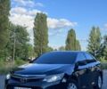Серый Тойота Камри, объемом двигателя 2.49 л и пробегом 225 тыс. км за 14800 $, фото 1 на Automoto.ua