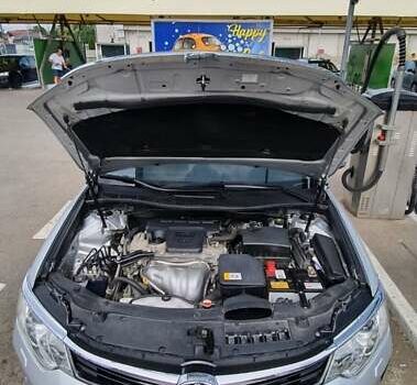 Серый Тойота Камри, объемом двигателя 2.5 л и пробегом 103 тыс. км за 16600 $, фото 1 на Automoto.ua