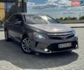 Сірий Тойота Камрі, об'ємом двигуна 2.5 л та пробігом 210 тис. км за 12999 $, фото 1 на Automoto.ua