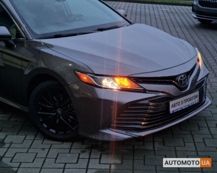 Сірий Тойота Камрі, об'ємом двигуна 2.5 л та пробігом 117 тис. км за 16553 $, фото 1 на Automoto.ua