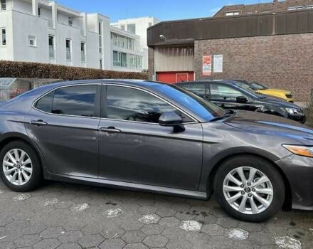 Серый Тойота Камри, объемом двигателя 2.5 л и пробегом 100 тыс. км за 17700 $, фото 1 на Automoto.ua