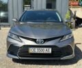 Сірий Тойота Камрі, об'ємом двигуна 2.49 л та пробігом 128 тис. км за 23999 $, фото 1 на Automoto.ua