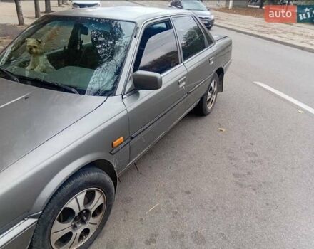 Серый Тойота Камри, объемом двигателя 2 л и пробегом 359 тыс. км за 1399 $, фото 1 на Automoto.ua