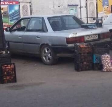 Серый Тойота Камри, объемом двигателя 2 л и пробегом 504 тыс. км за 1700 $, фото 1 на Automoto.ua