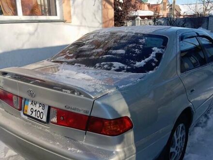 Серый Тойота Камри, объемом двигателя 2.16 л и пробегом 385 тыс. км за 3900 $, фото 1 на Automoto.ua