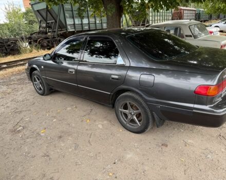 Серый Тойота Камри, объемом двигателя 3 л и пробегом 320 тыс. км за 4000 $, фото 1 на Automoto.ua