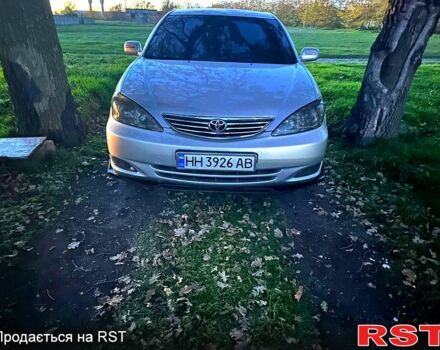 Серый Тойота Камри, объемом двигателя 3 л и пробегом 285 тыс. км за 7000 $, фото 1 на Automoto.ua